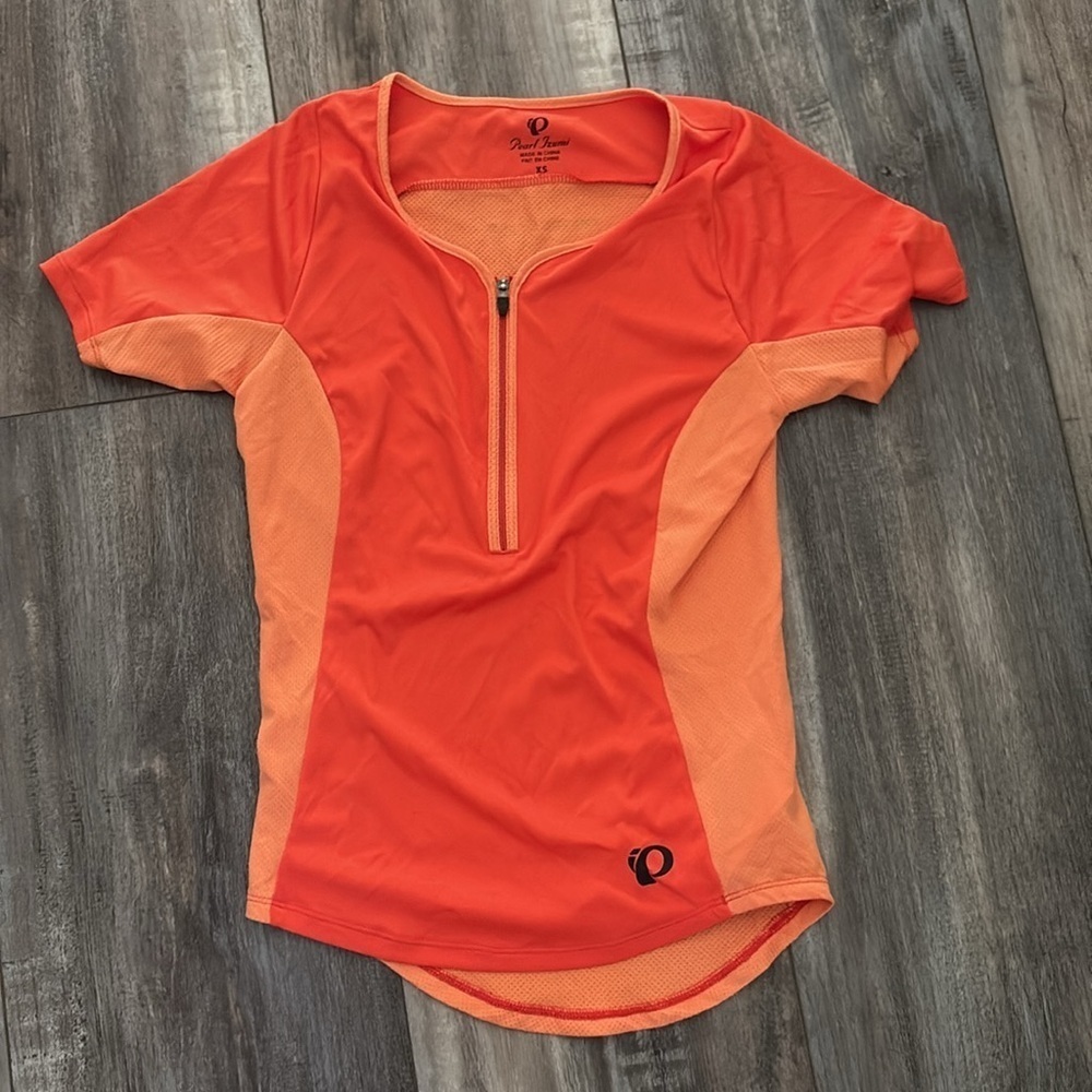 Pearl Izumi orange and coral quarter zip shirt xs